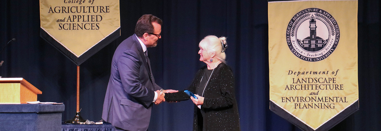 Ken White handing award to recipient