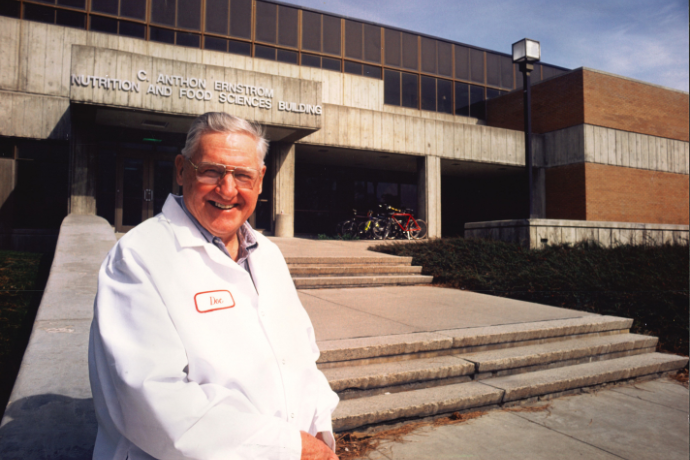 Professors Ernstrom in front of the C. Anthon Ernstrom Nutrition and Food Sciences Building