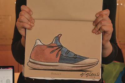 Veronica Villhard with one of her shoe design sketches