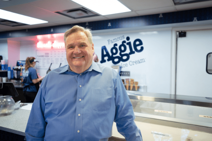 Reed Ernstrom stands in front of Aggie Ice Cream