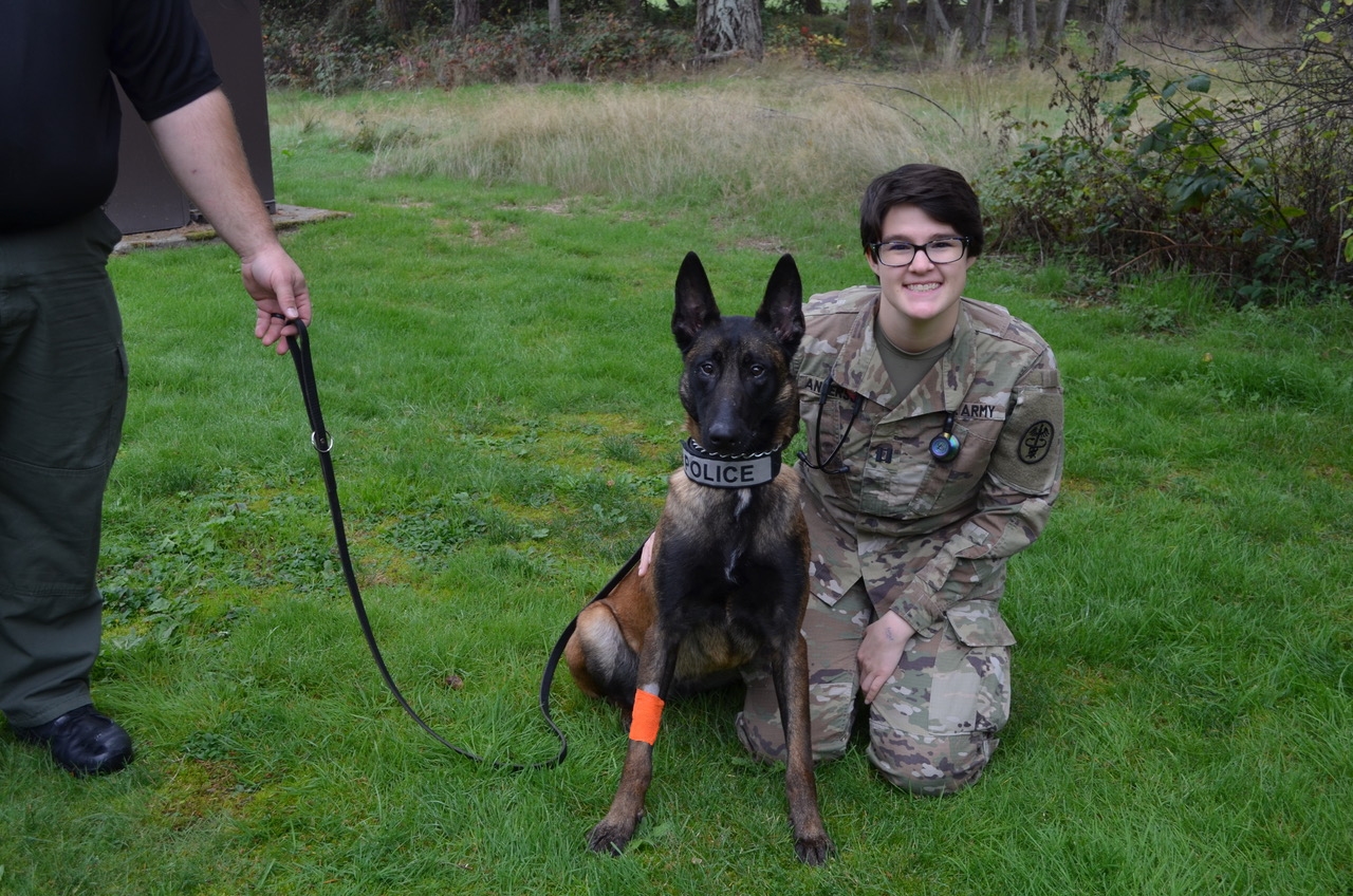 Capt. Stacie Anderson with a military dog