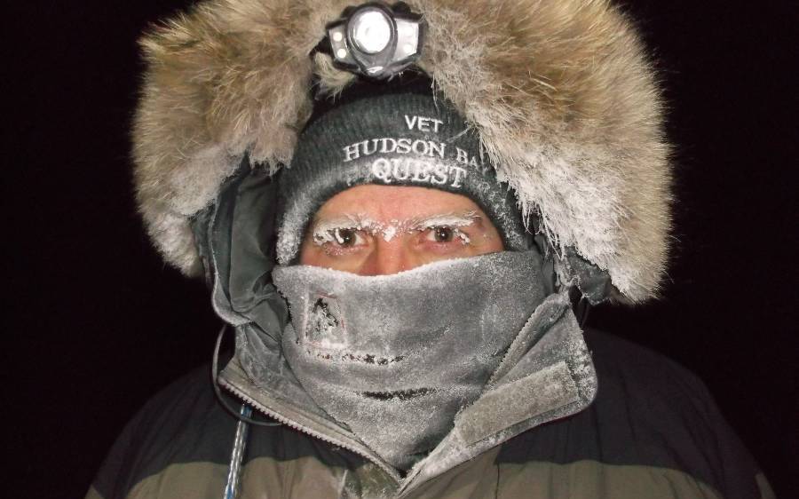 Dr. Drew Allen works with frozen eyebrows and eyelashes in the Manitoba tundra.