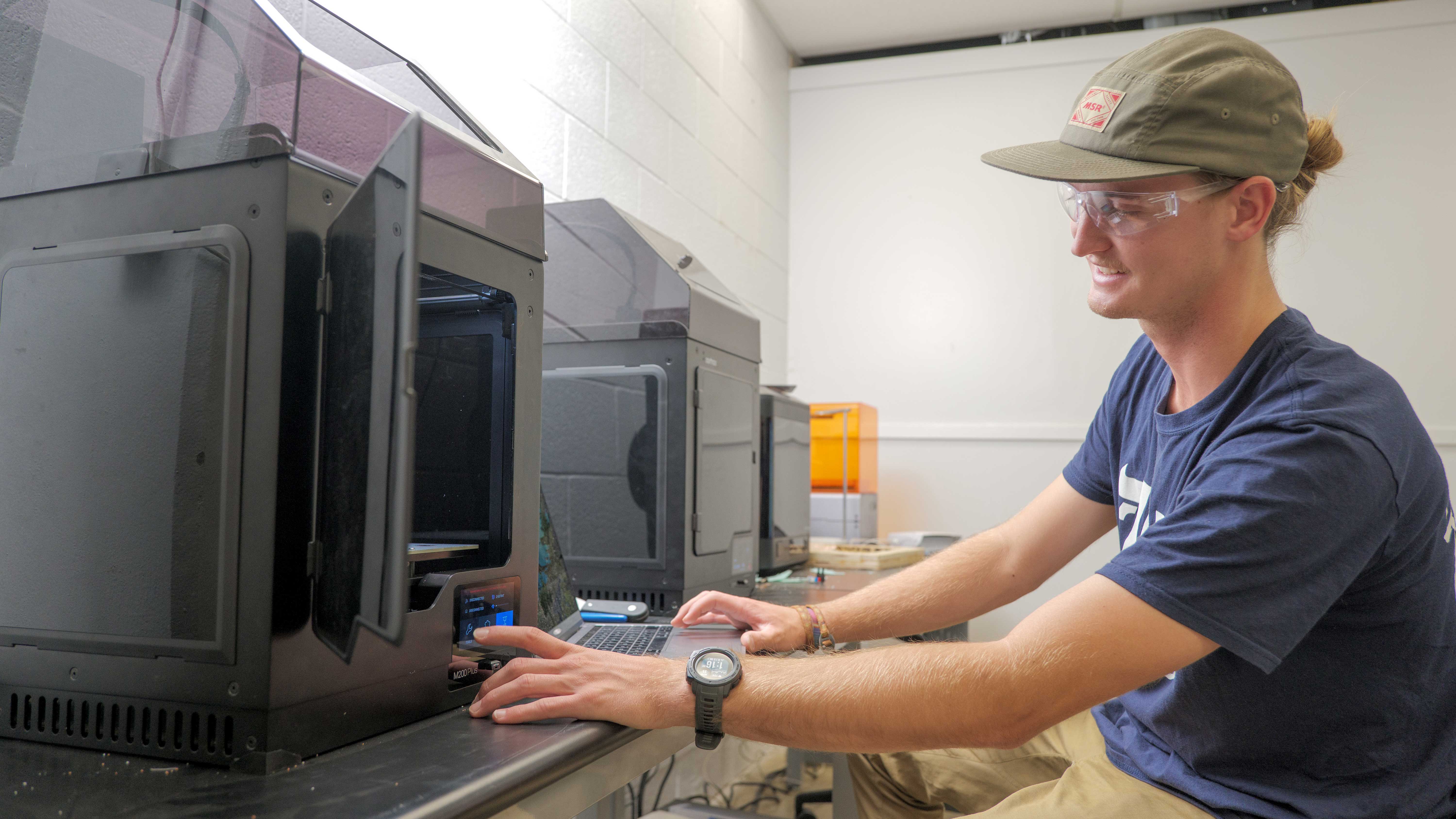 Technology Systems student working in the 3D printing lab.